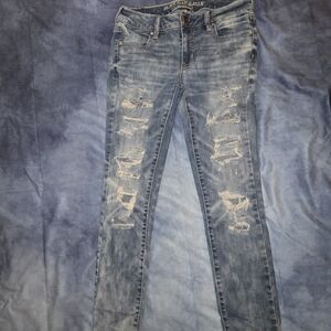 Distressed Blue Jeans